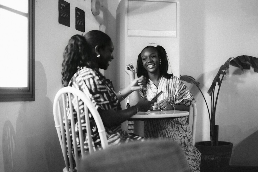 seniors at coffee table conversation