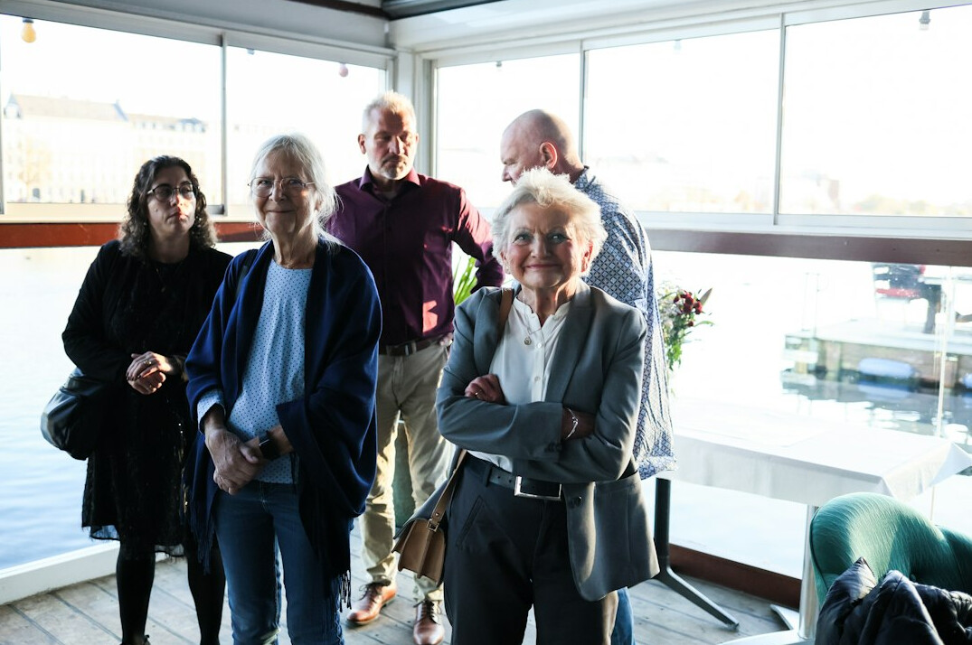 group of elderly friends laughing